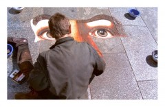 Ein Strassenmaler vor dem Kölner Dom